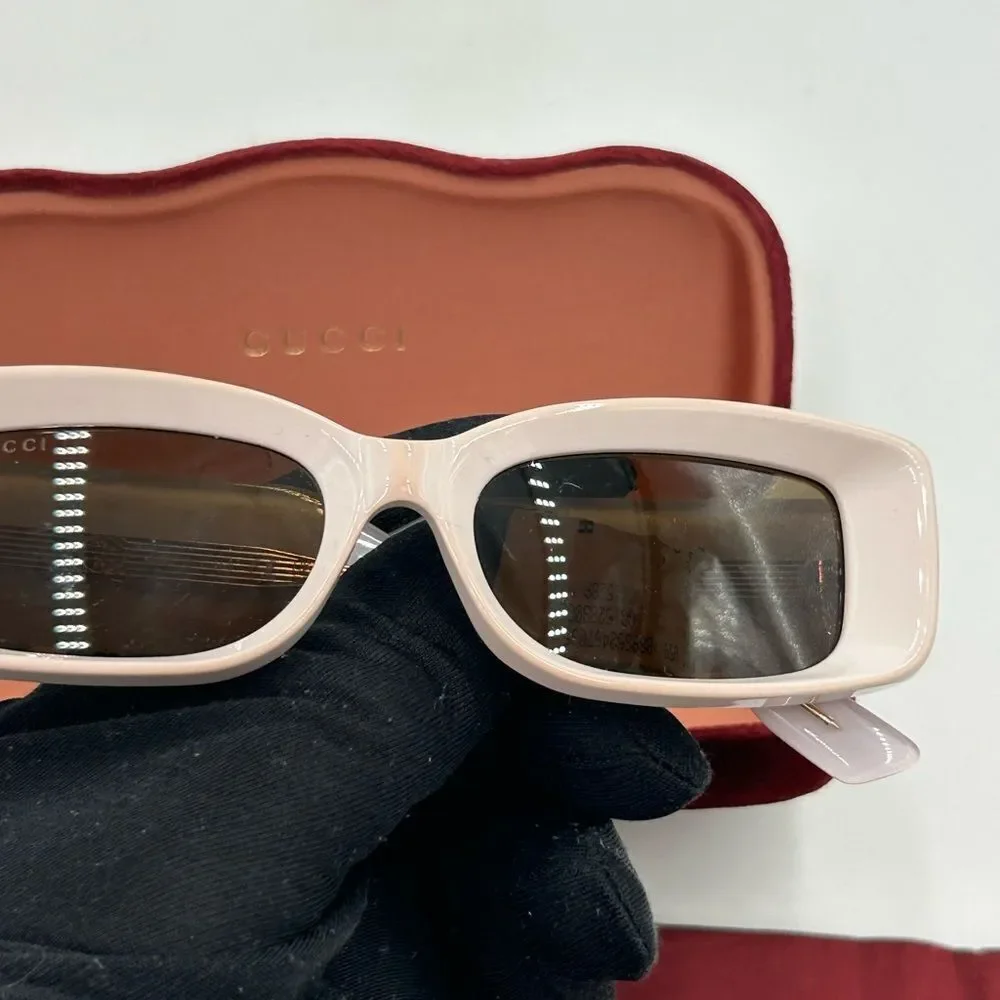 Women's Gucci 53 mm rectangular  sunglasses made in Italy